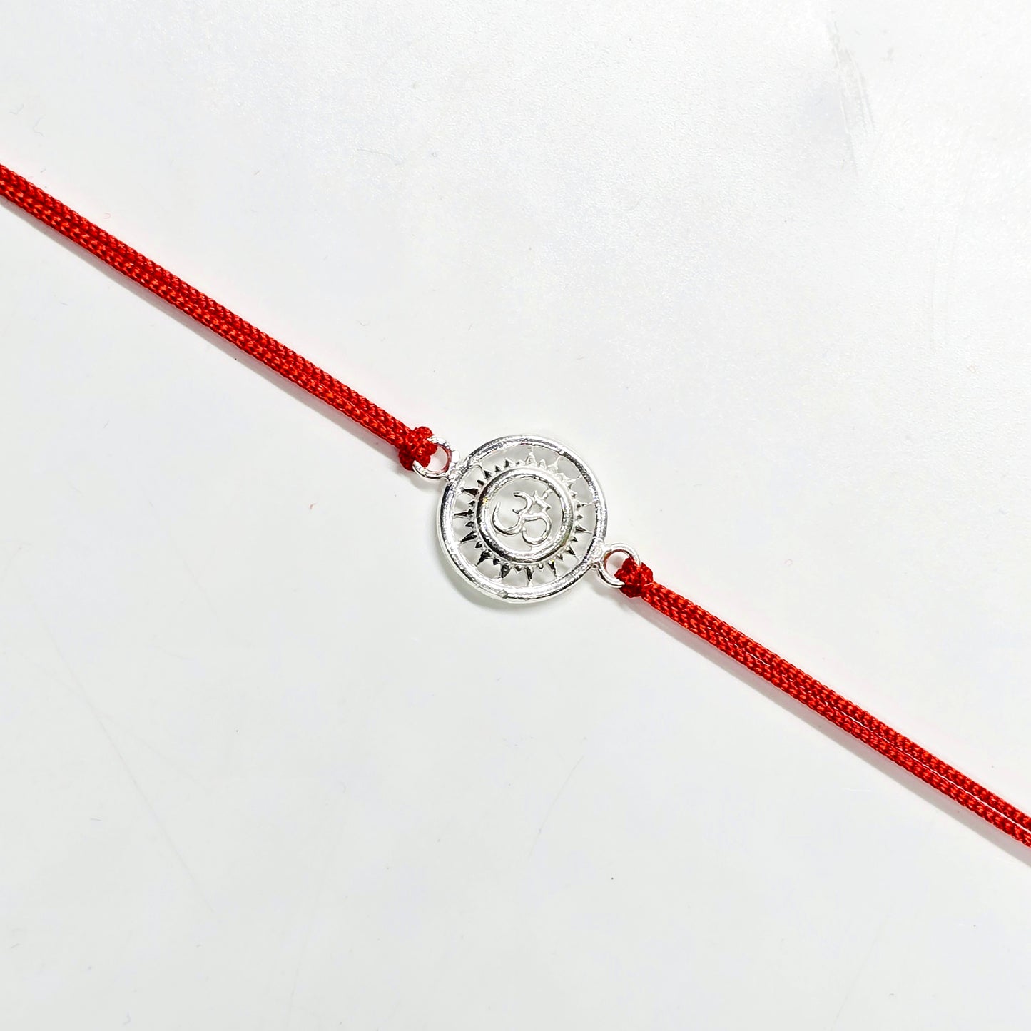 925 PURE SILVER RAKHI WITH THREAD IN "OM" DESIGN