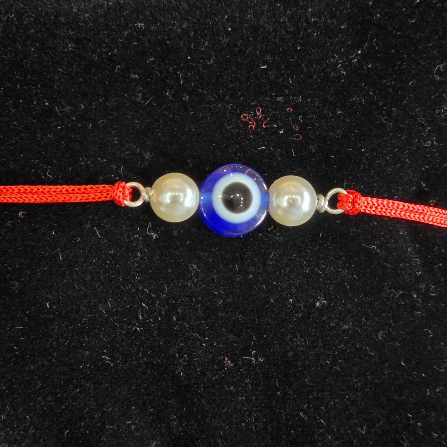 Evil eye with Pearl silver rakhi