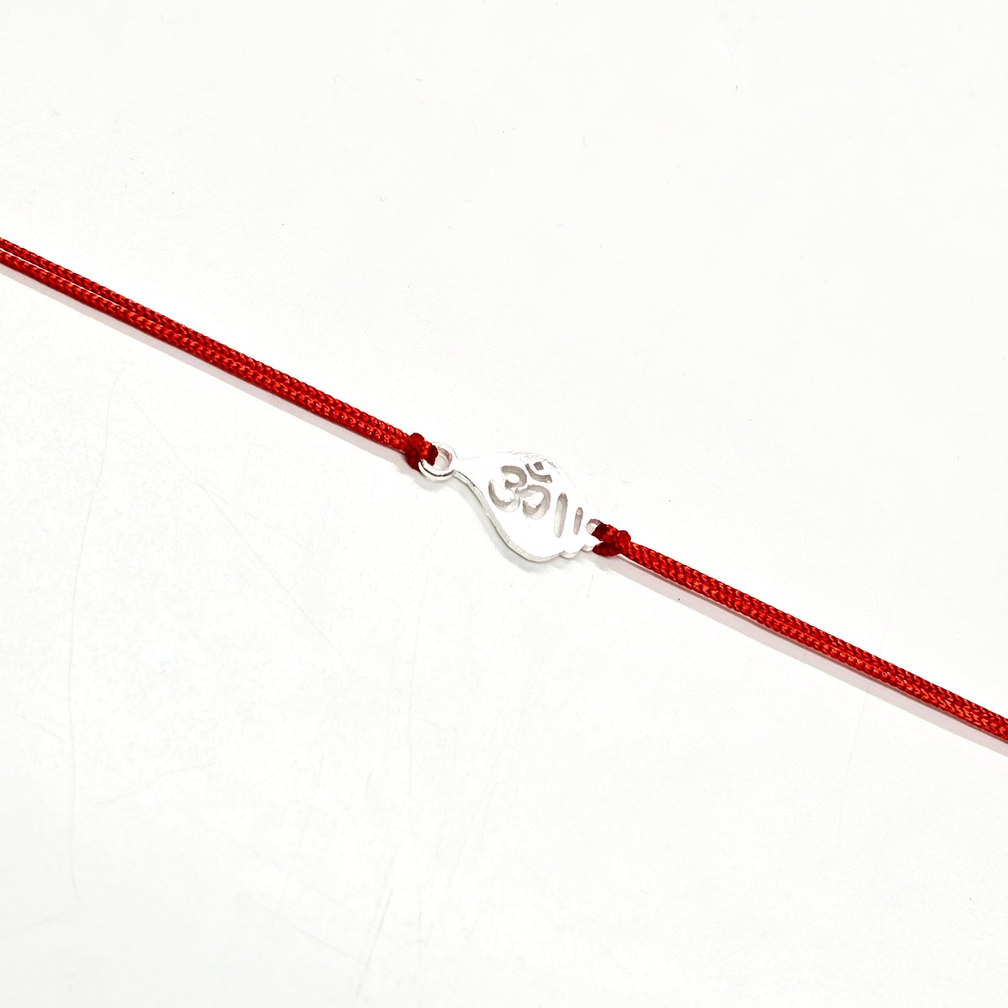 925 PURE SILVER RAKHI WITH THREAD IN "OM" DESIGN