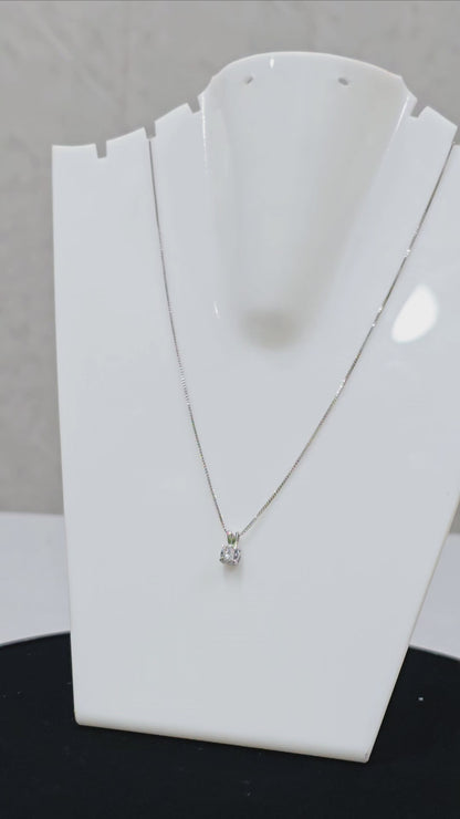 A Smooth Finishing Teen Chain With A Single Diamond Cut Stone Pandant